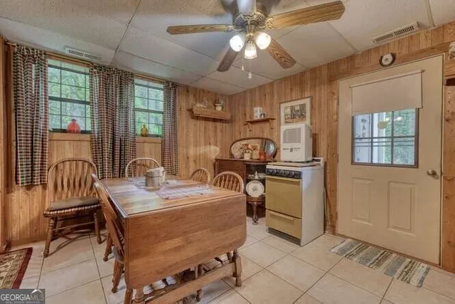 a view of a two chairs in the balcony