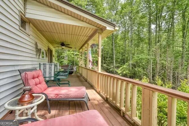 a view of a car park in front of a house