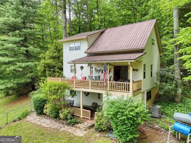 a view of a two chair in the balcony