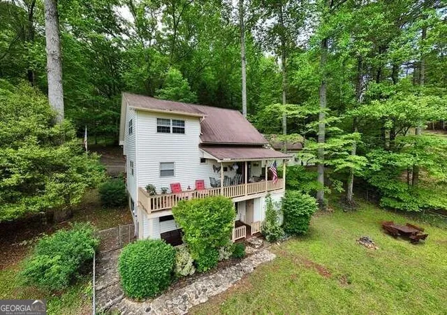 a view of balcony with furniture