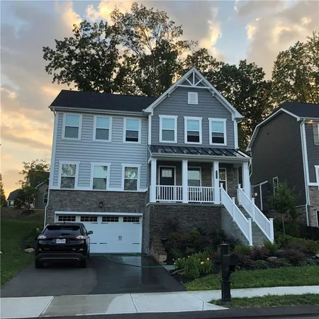 a house view with a garden space