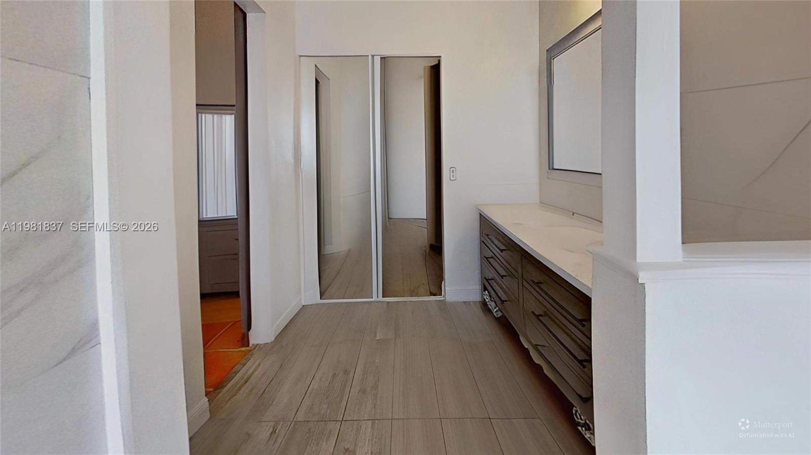 3760 Westminster Street Hollywood, FL 33021 - Photo 19 of 42 a view of hallway with wooden floor