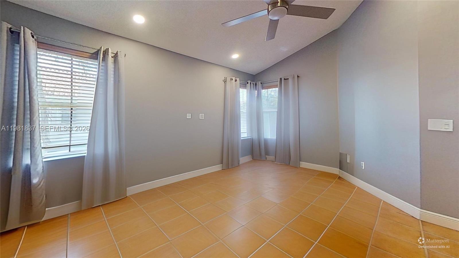3760 Westminster Street Hollywood, FL 33021 - Photo 22 of 42 a view of an empty room with a window