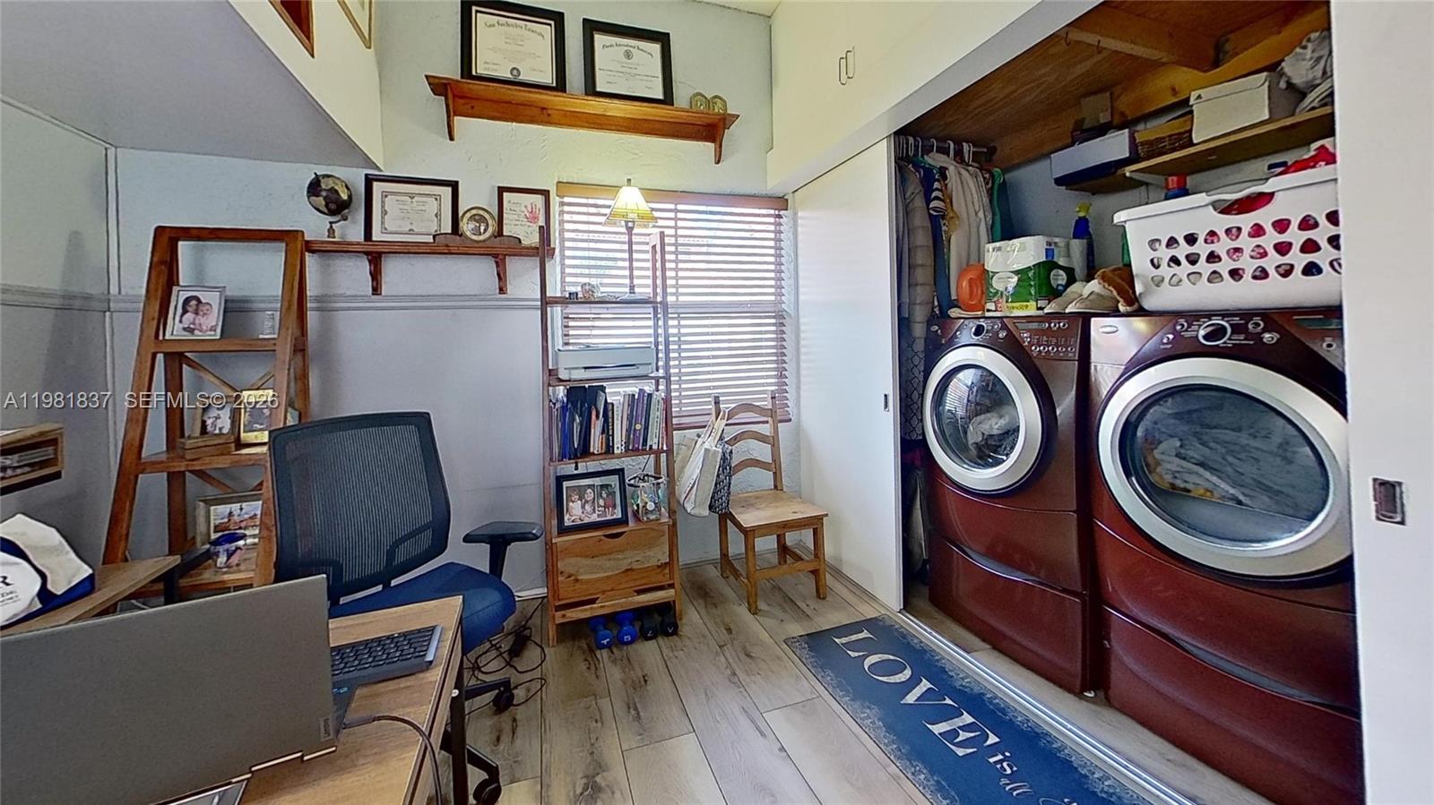 3760 Westminster Street Hollywood, FL 33021 - Photo 25 of 42 a view of a room with washer and dryer