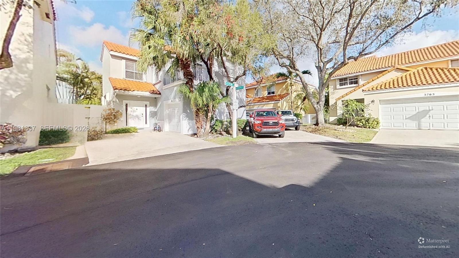 3760 Westminster Street Hollywood, FL 33021 - Photo 30 of 42 a view of city street with a building on the roadside