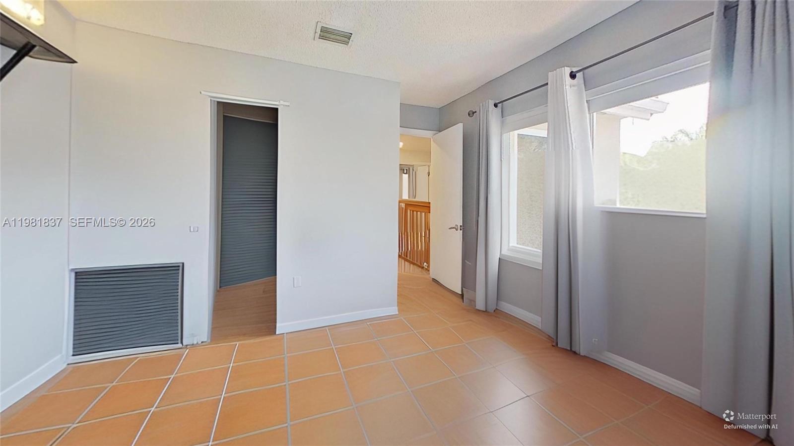 3760 Westminster Street Hollywood, FL 33021 - Photo 34 of 42 a view of an empty room with a window