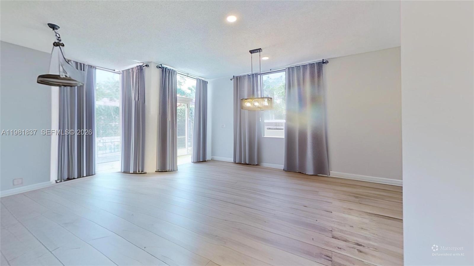 3760 Westminster Street Hollywood, FL 33021 - Photo 7 of 42 a view of a room with wooden floor