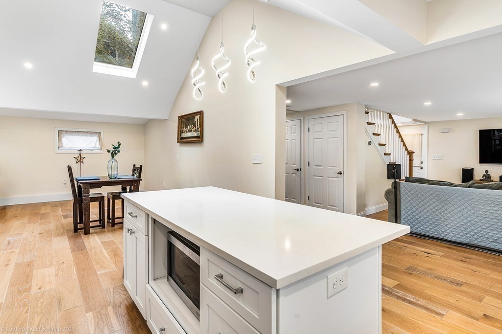 26 Mill Street Maynard, MA 01754 - Photo 14 of 29 a kitchen with a table and chairs