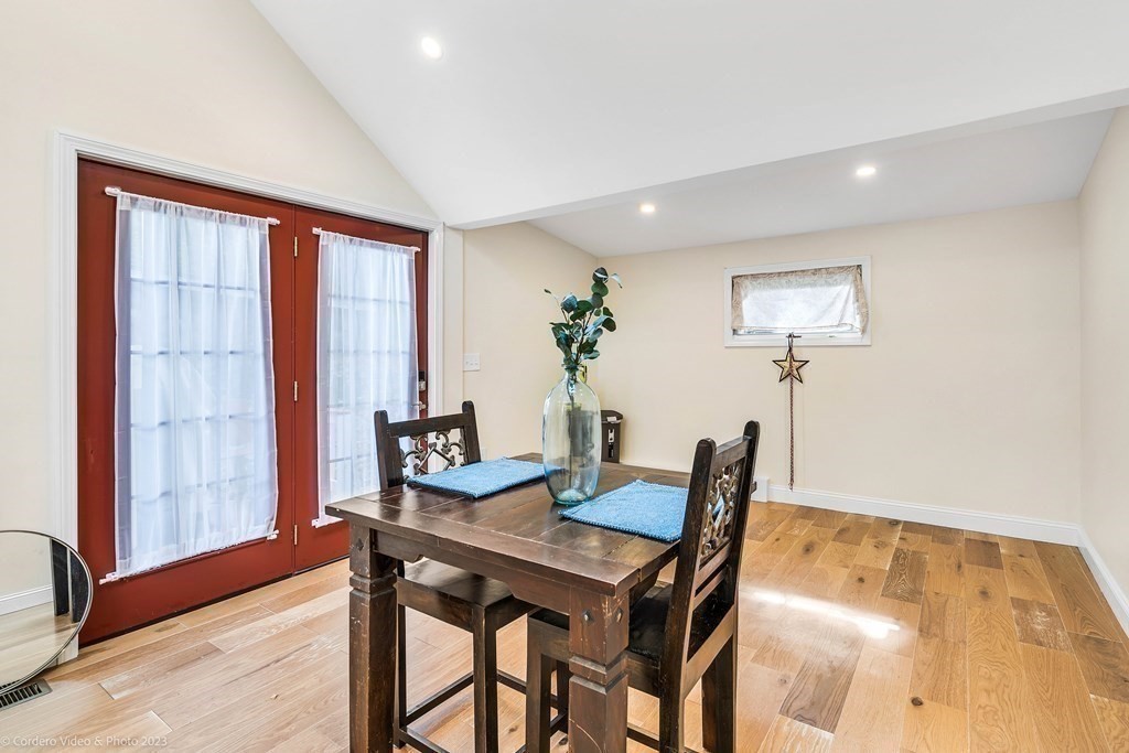 26 Mill Street Maynard, MA 01754 - Photo 15 of 29 a view of a dining room with furniture and window