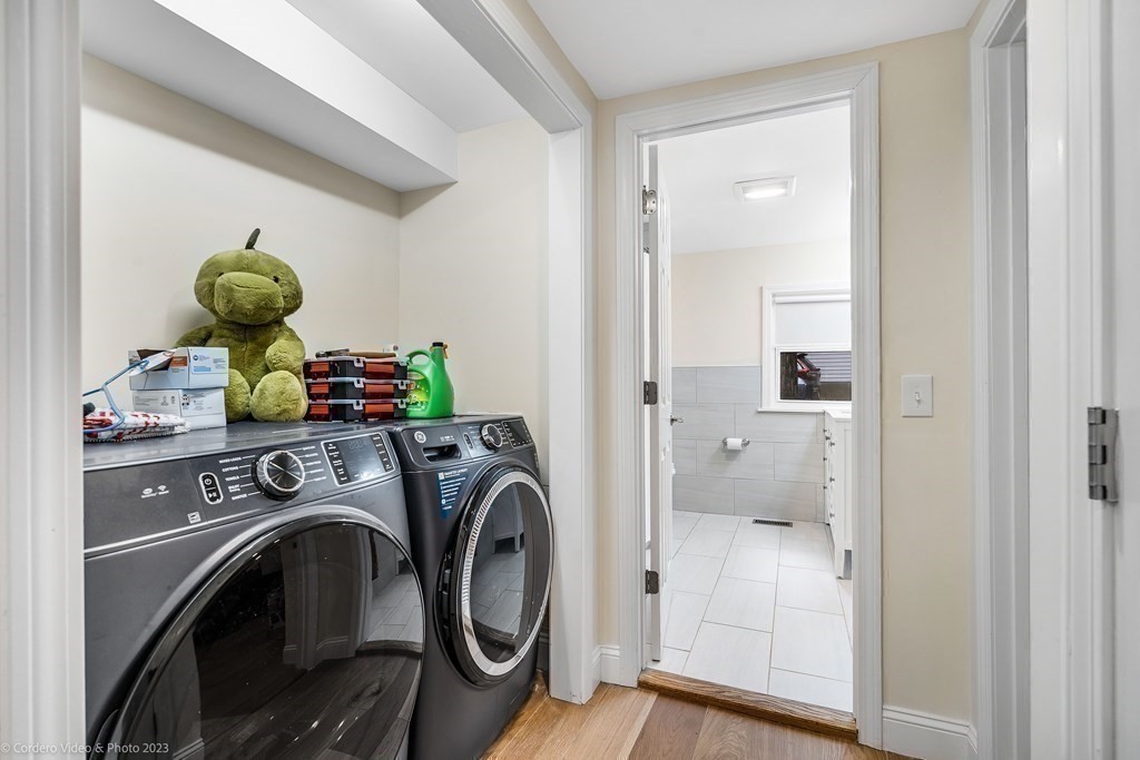 26 Mill Street Maynard, MA 01754 - Photo 20 of 29 a utility room with dryer and washer