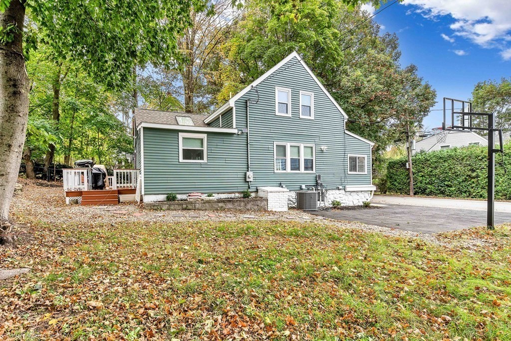26 Mill Street Maynard, MA 01754 - Photo 8 of 29 a view of a house with a patio