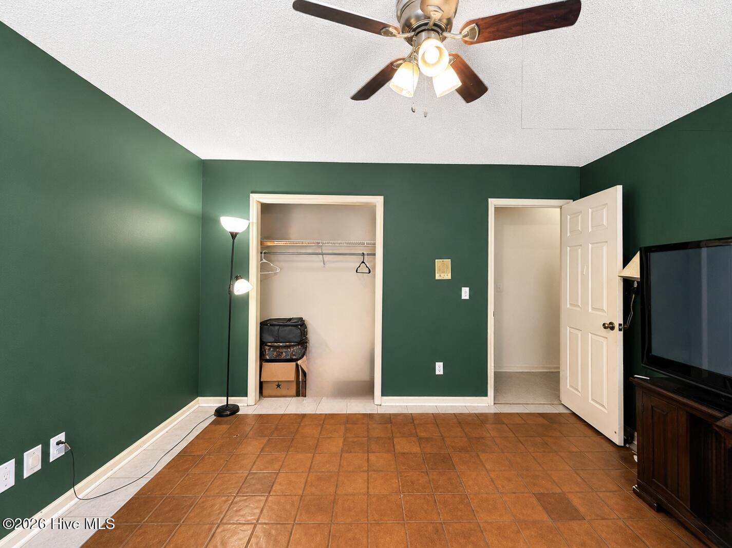 2315 Robert Hoke Road Wilmington, NC 28412 - Photo 42 of 89 Downstairs bedroom set off to the side with a full bath next door.