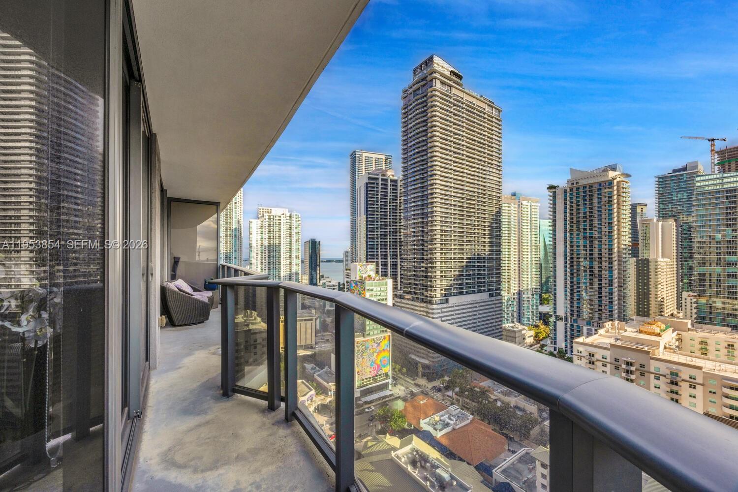 55 Southwest 9th Street, Unit 2406 Miami, FL 33130 - Photo 1 of 38 a view of balcony with couch