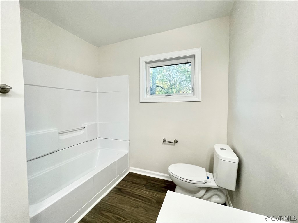 11300 Buckley Hall Road Mathews, VA 23109 - Photo 13 of 31 a bathroom with a toilet and a bathtub