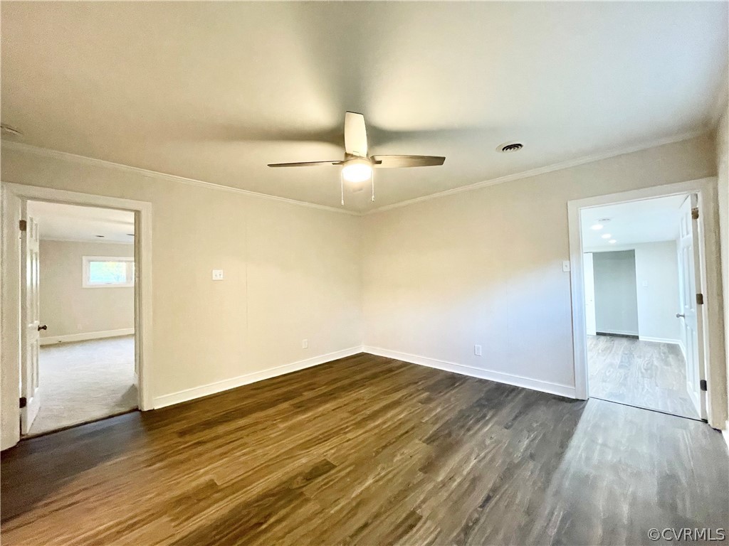 11300 Buckley Hall Road Mathews, VA 23109 - Photo 15 of 31 wooden floor in an empty room with a window