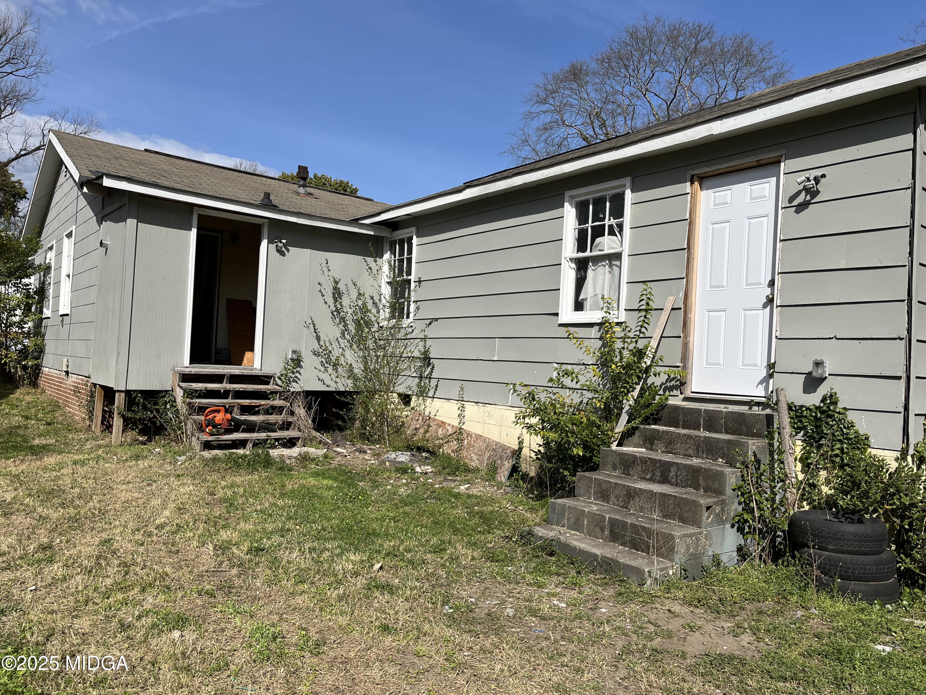 532 Nelson Street Macon, GA 31206 - Photo 14 of 15 a view of house with backyard