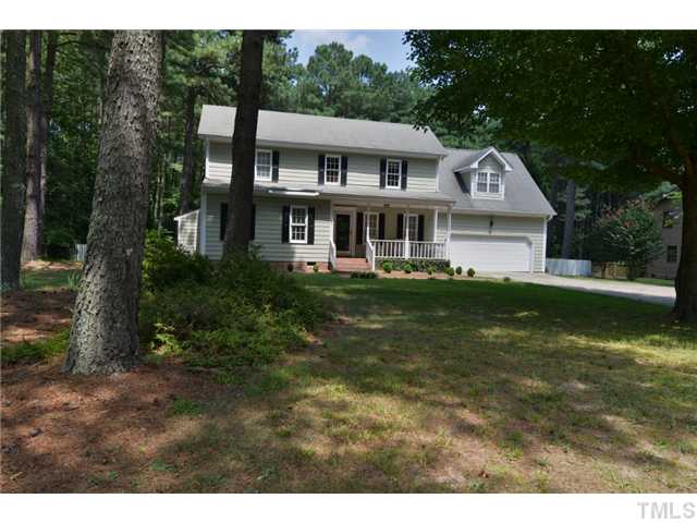 13612 Durant Road Raleigh, NC 27614 - Photo 1 of 20 a front view of a house with a garden