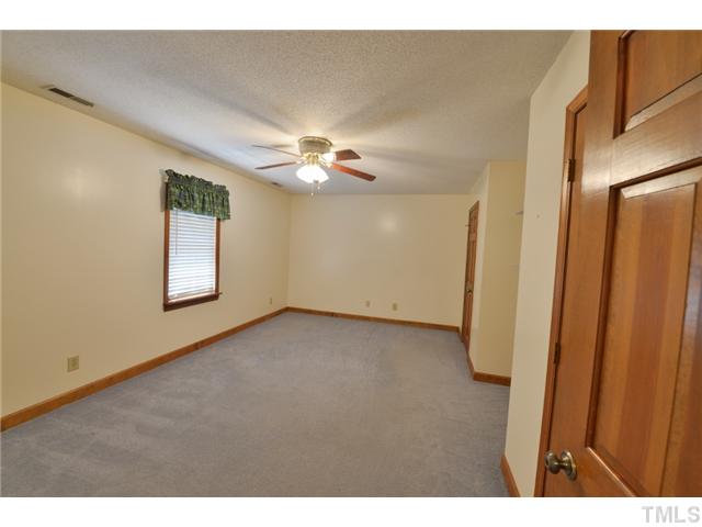 13612 Durant Road Raleigh, NC 27614 - Photo 13 of 20 a view of a livingroom with an empty space