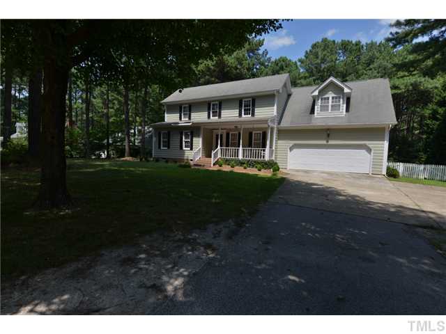 13612 Durant Road Raleigh, NC 27614 - Photo 2 of 20 a front view of a house with a garden