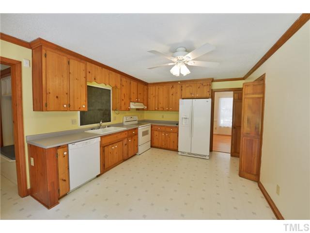13612 Durant Road Raleigh, NC 27614 - Photo 9 of 20 a kitchen with stainless steel appliances a refrigerator sink and cabinets