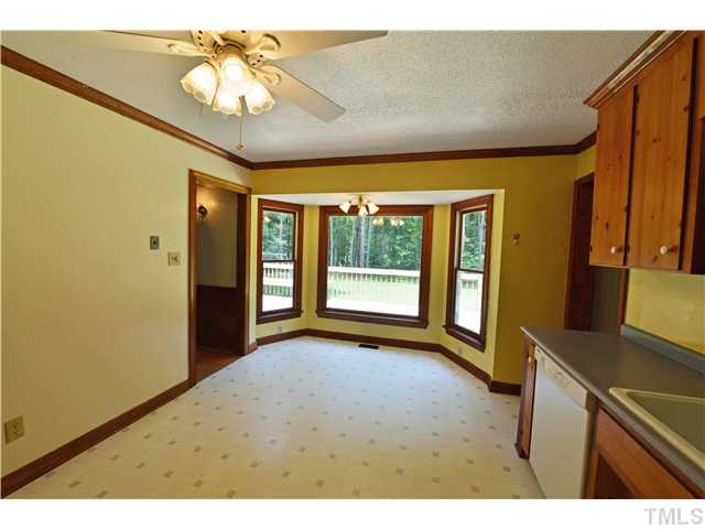13612 Durant Road Raleigh, NC 27614 - Photo 10 of 20 a view of an empty room with a window