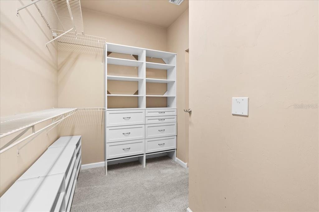 9834 Northwest 17th Road Gainesville, FL 32606 - Photo 21 of 51 a view of an empty walk in closet