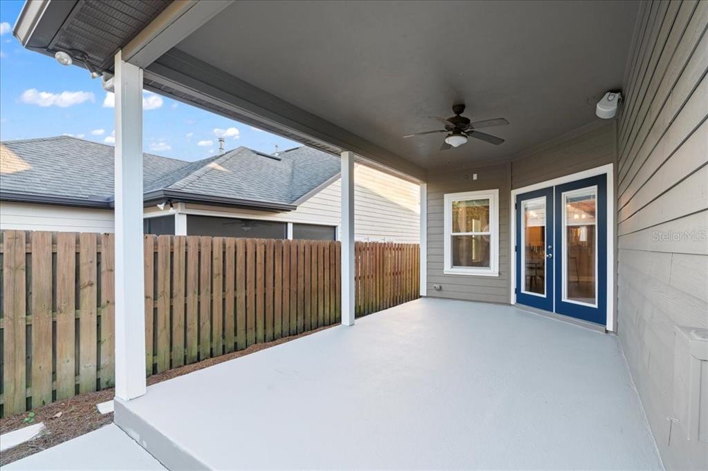 9834 Northwest 17th Road Gainesville, FL 32606 - Photo 35 of 51 a view of an empty room with a balcony