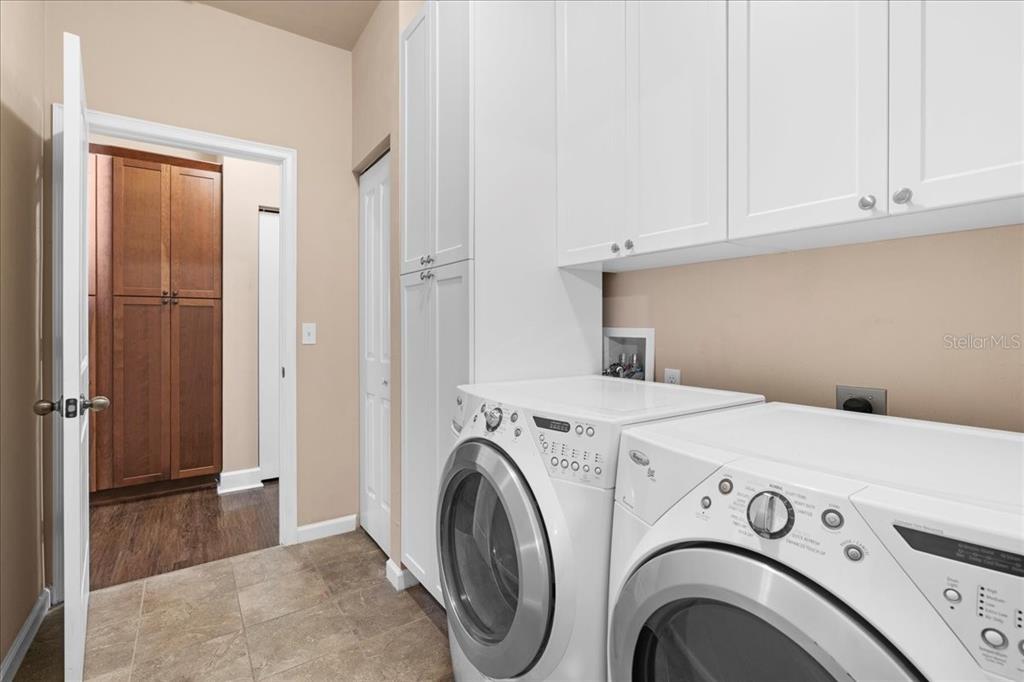 9834 Northwest 17th Road Gainesville, FL 32606 - Photo 37 of 51 a utility room with dryer and washer