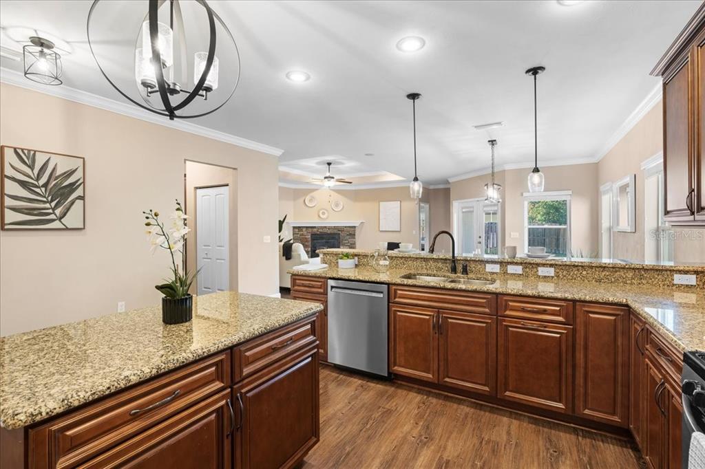 9834 Northwest 17th Road Gainesville, FL 32606 - Photo 7 of 51 a kitchen with lots of counter space and a sink