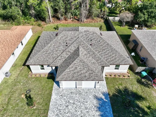 a view of a backyard with plants