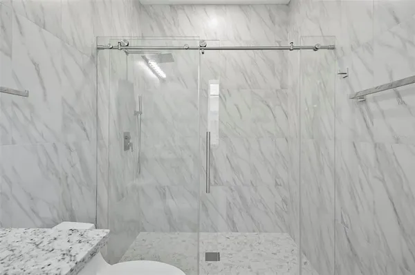 a bathroom with a shower curtain