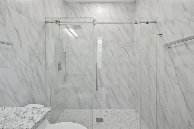 a bathroom with a shower curtain
