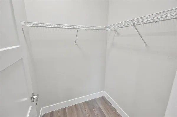 a view of a room with racks on the wall