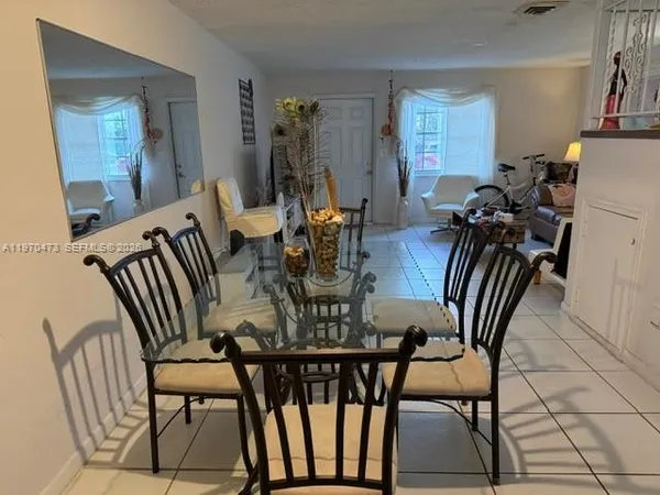 a view of a dining room with furniture