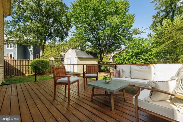 a view of a chairs and table on the deck