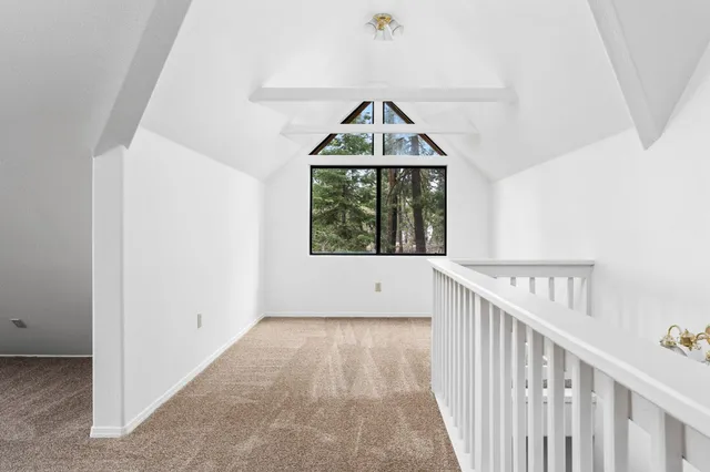 a view of hallway with a window