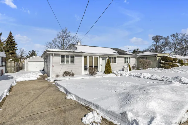 a view of a hallway with washer and dryer