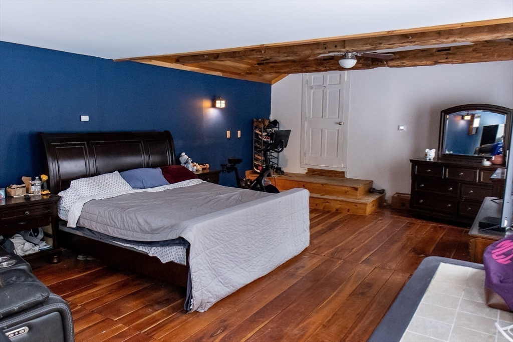 20 Paige Hill Road Brimfield, MA 01010 - Photo 24 of 40 a bed room with a bed and a television