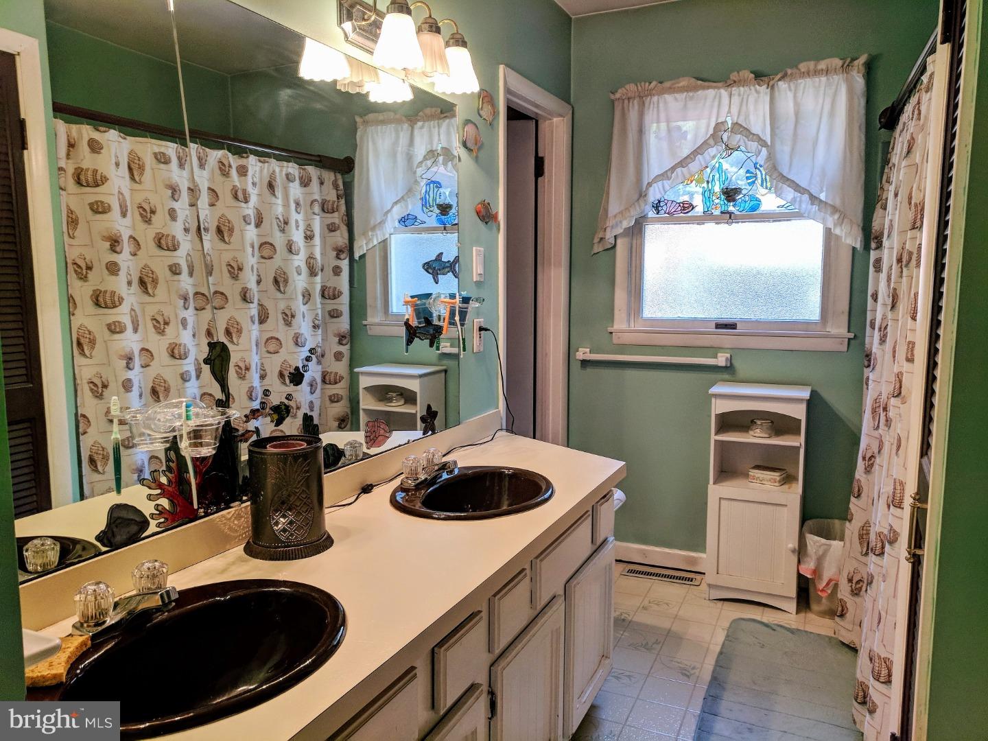 1144 Upper Van Reed Road Leesport, PA 19533 - Photo 11 of 25 a kitchen with a stove and a refrigerator