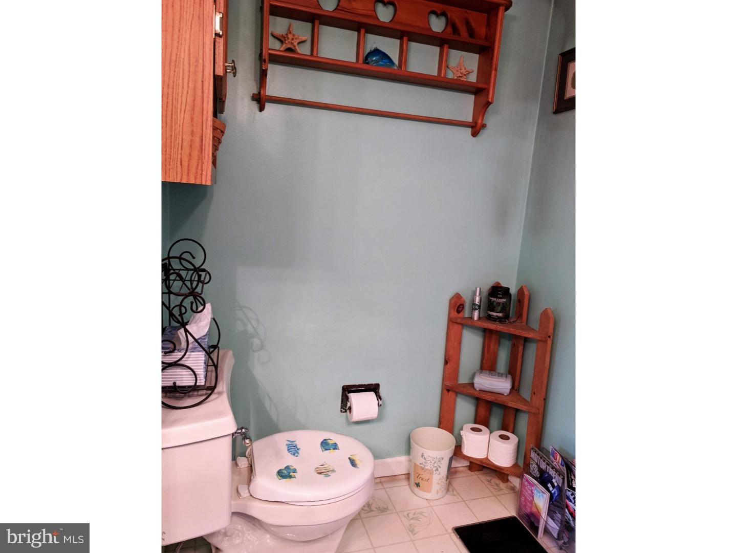 1144 Upper Van Reed Road Leesport, PA 19533 - Photo 13 of 25 a room with a book shelf and a couch