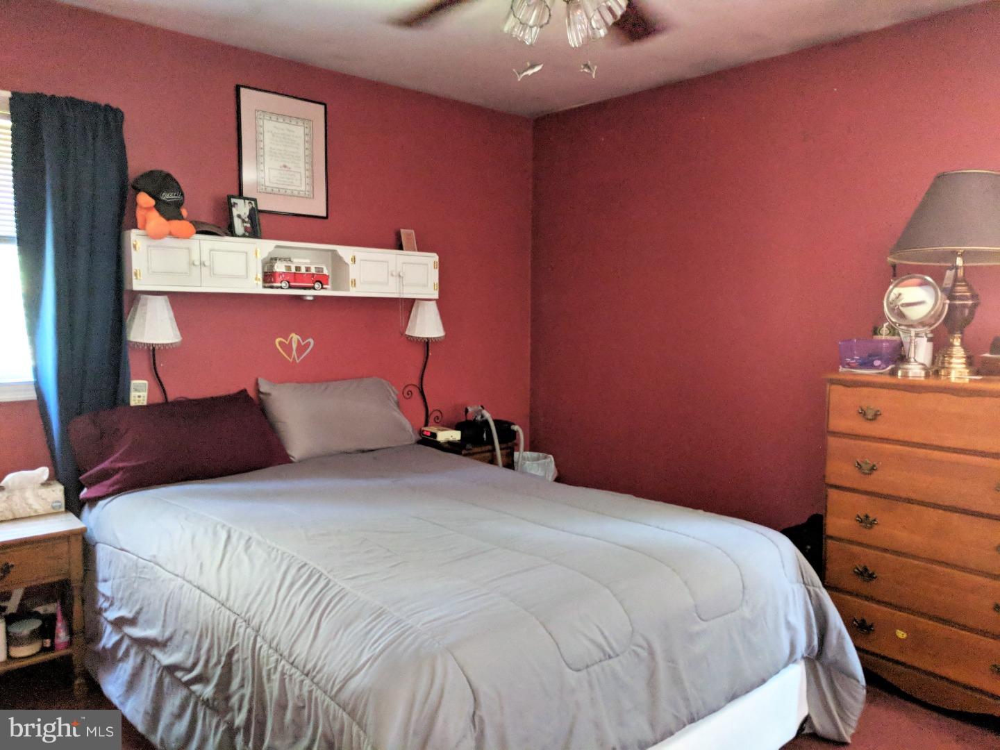 1144 Upper Van Reed Road Leesport, PA 19533 - Photo 15 of 25 a bedroom with a bed and a dresser