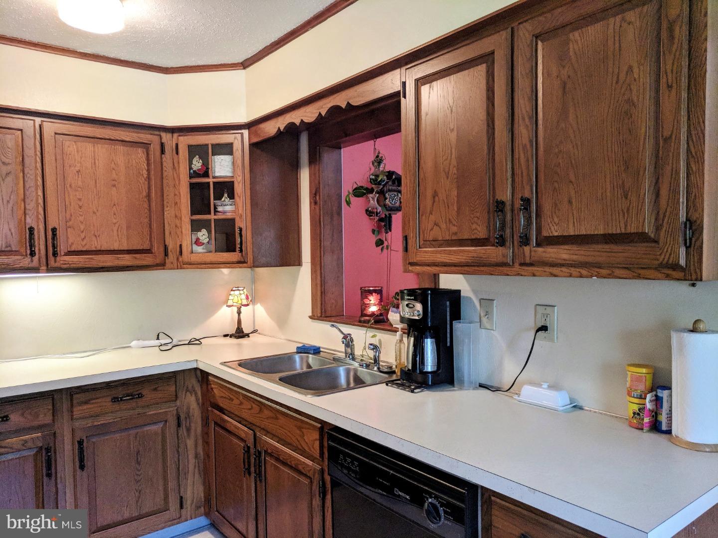 1144 Upper Van Reed Road Leesport, PA 19533 - Photo 5 of 25 a kitchen with a sink dishwasher and cabinets
