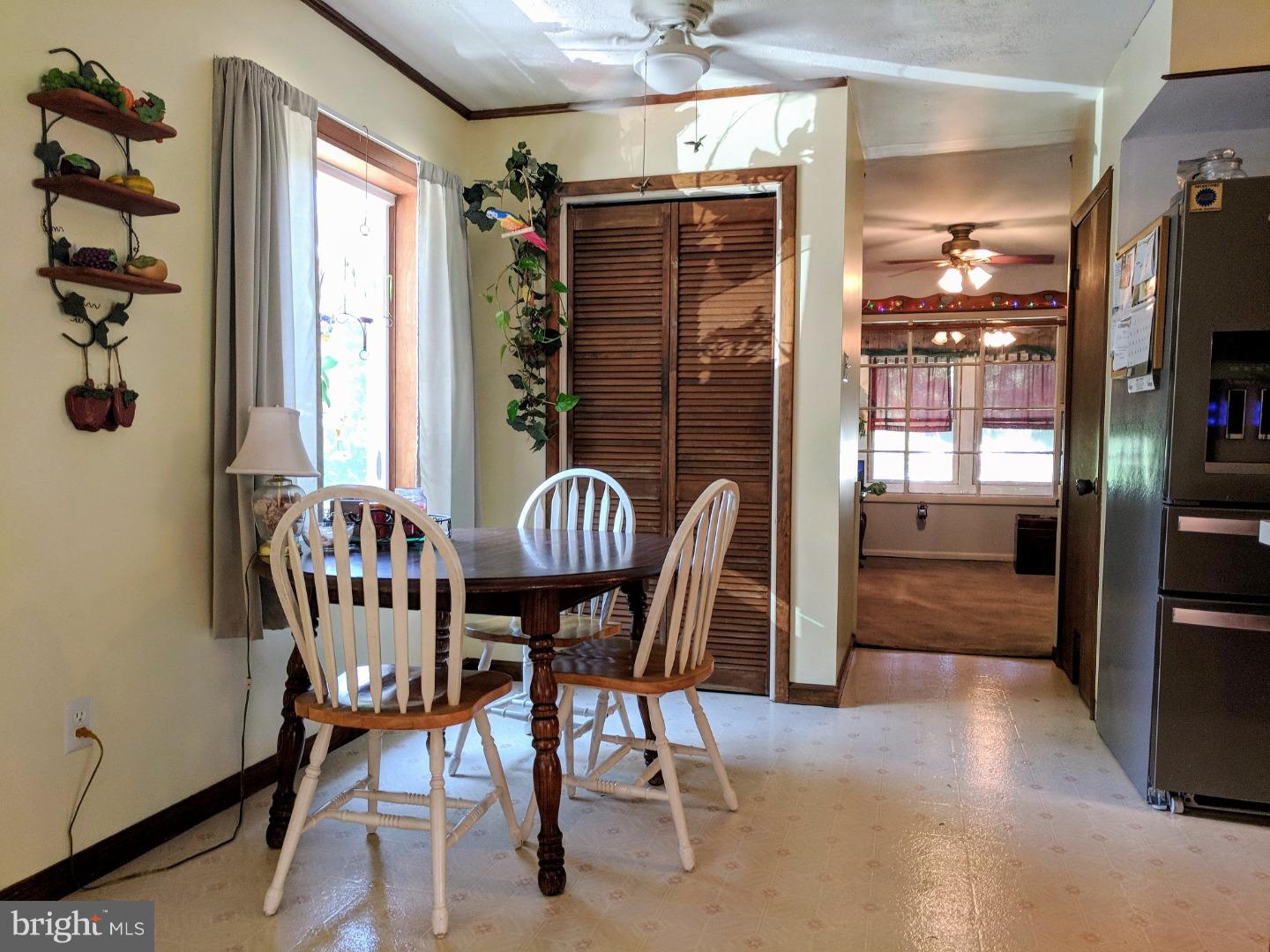 1144 Upper Van Reed Road Leesport, PA 19533 - Photo 6 of 25 a view of a dining room with furniture window and outside view