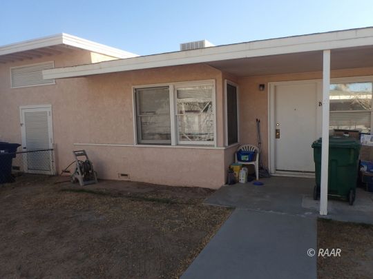 417 South Richmond Road Ridgecrest, CA 93555 - Photo 7 of 7 an empty room with windows