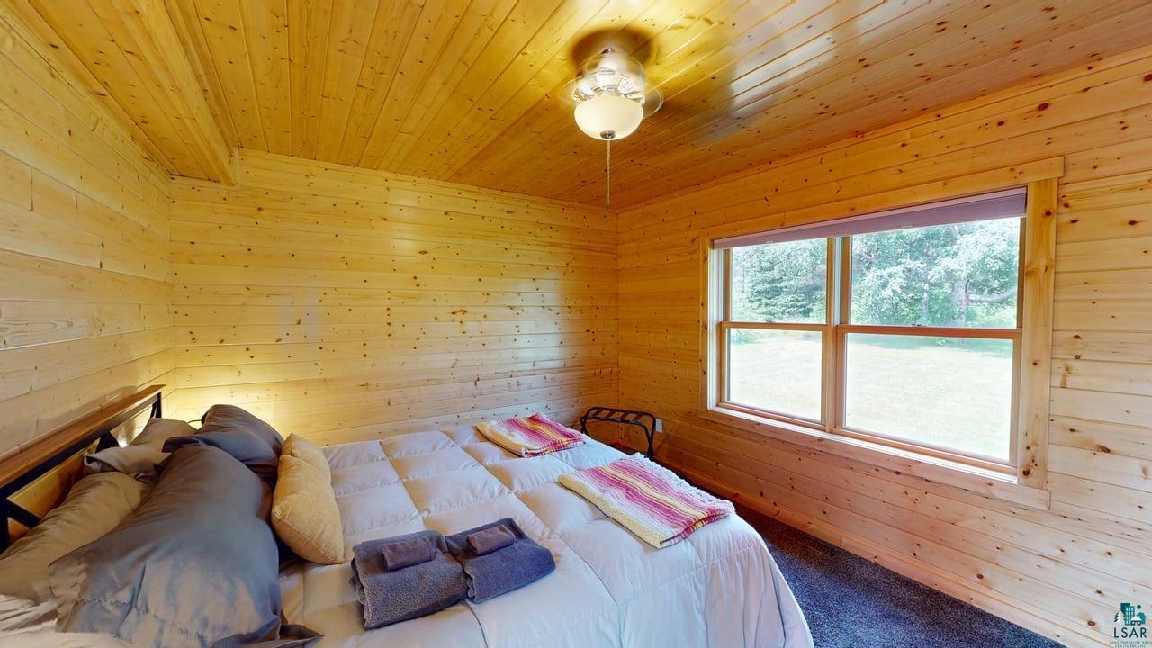 121 Ski Hill Road Lutsen, MN 55612 - Photo 23 of 47 Main Level Primary Bedroom