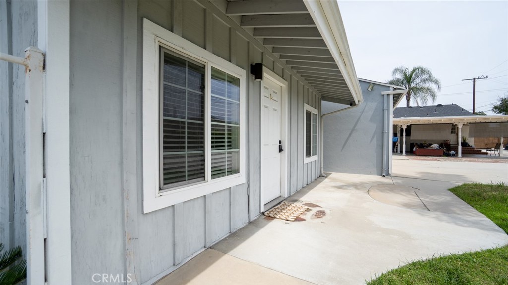 11921 Stamy Road La Mirada, CA 90638 - Photo 15 of 21 a view of a house with a door and a window