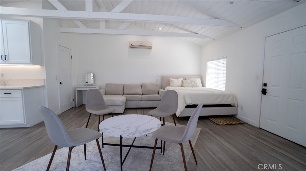11921 Stamy Road La Mirada, CA 90638 - Photo 6 of 21 a bed room with a bed and a chair