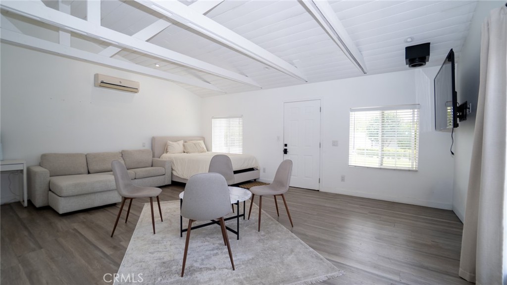 11921 Stamy Road La Mirada, CA 90638 - Photo 8 of 21 a living room with furniture and a window