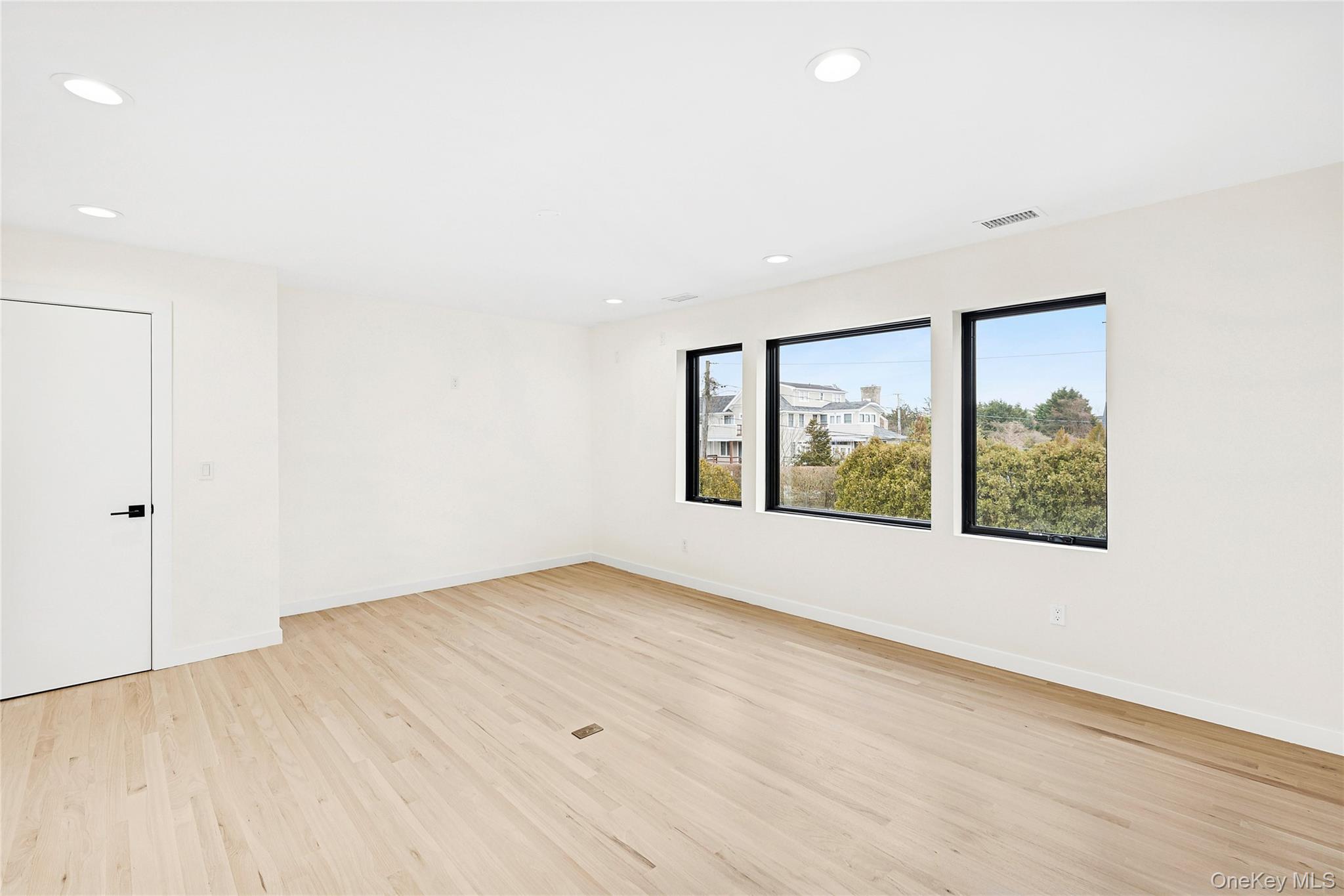 3 Shore Lane Westhampton, NY 11977 - Photo 15 of 17 Empty room featuring light wood-style flooring and recessed lighting