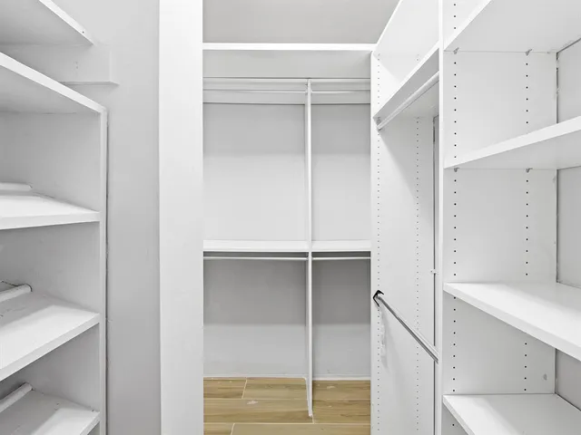 a view of empty room with windows